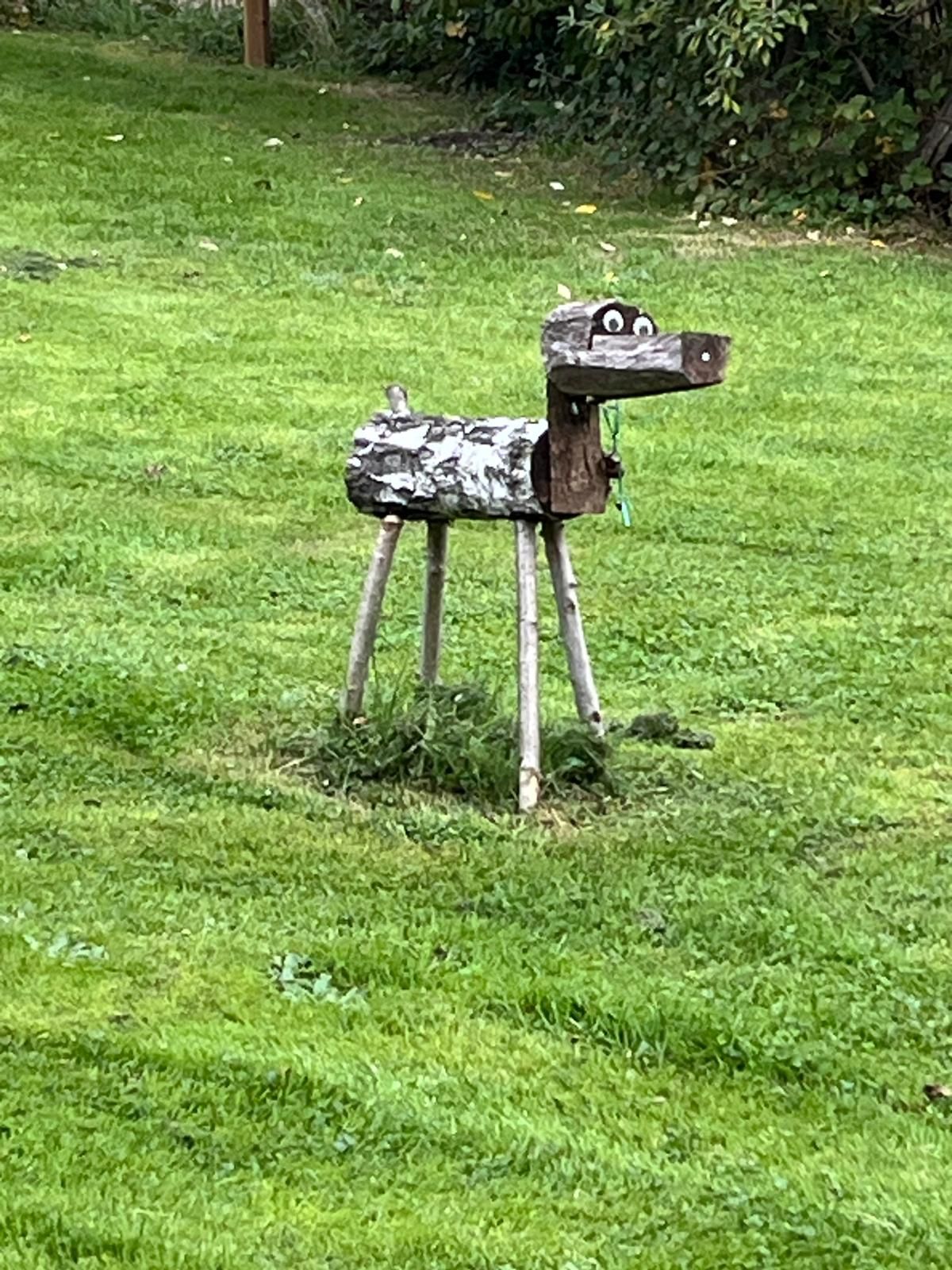 Wooden dog statue